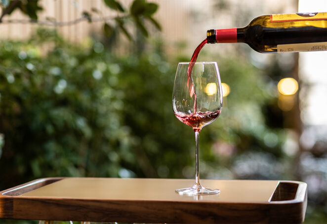 Red Wine Being Poured at Le Pavillon