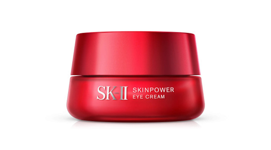 A red jar of SK-II Skinpower Eye Cream with white text on the front, displayed against a plain white background.