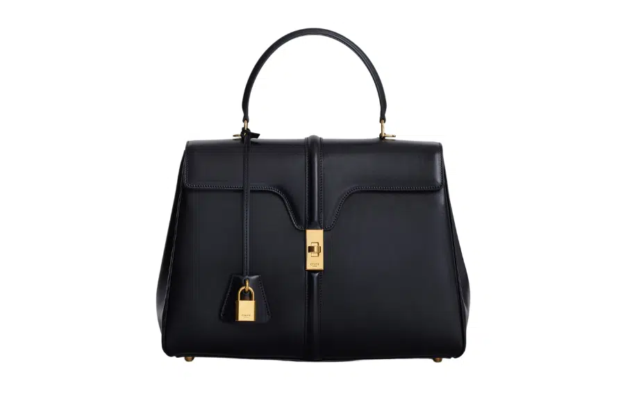 Celine Classique 16 A black leather handbag with a top handle, gold hardware, a front flap, and a gold padlock decorative accent.