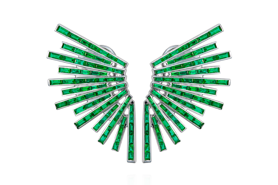 Maison H Jewels emerald earrings A pair of earrings shaped like stylized wings, featuring multiple rectangular green gemstones set in silver, radiating outward symmetrically against a white background.
