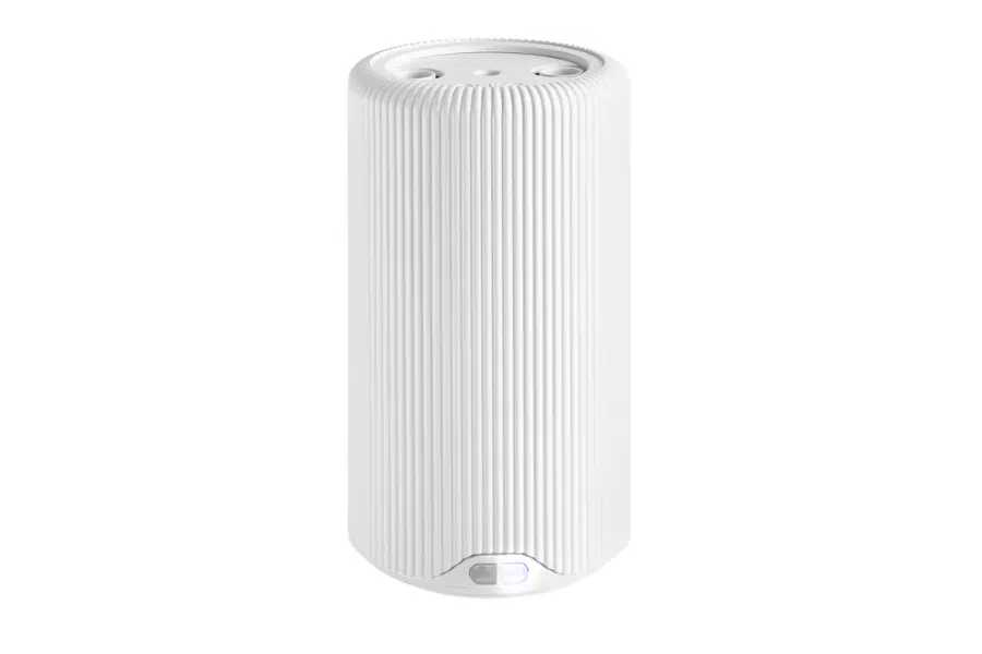 A tall, cylindrical white portable speaker with vertical ridges and control buttons on the top, standing upright against a plain white background.