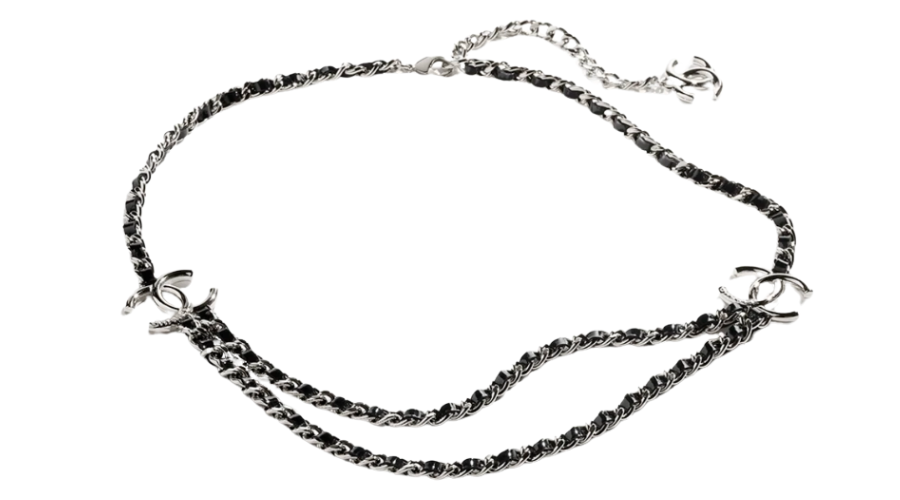 A silver chain belt with black leather woven through, featuring two interlocking double C logos and an adjustable clasp with a dangling logo charm.