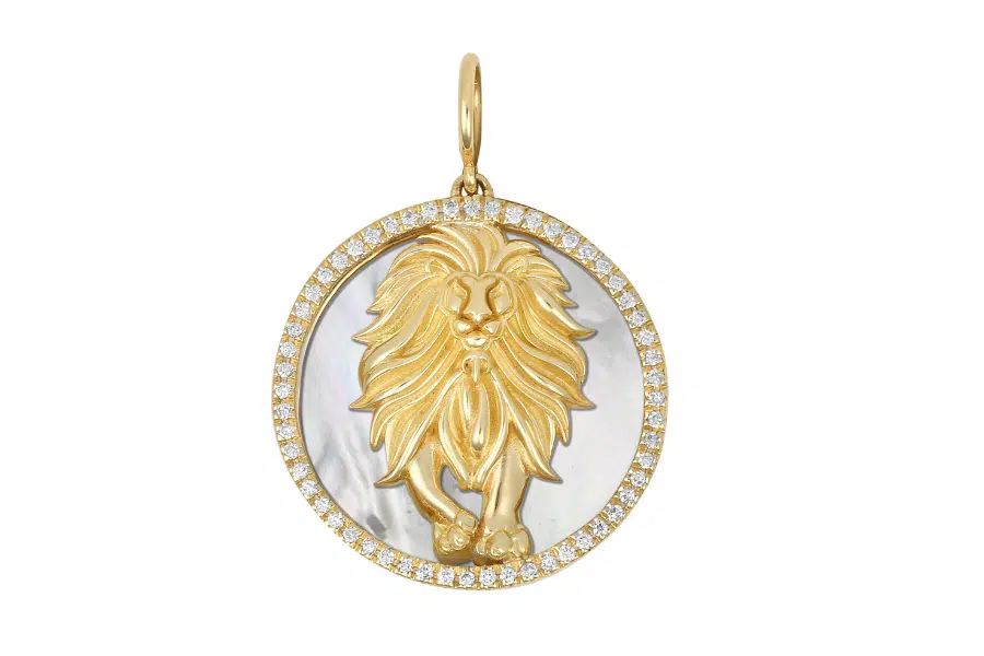 A gold pendant featuring a detailed lion design over a white background, surrounded by a border of small, sparkling diamonds.