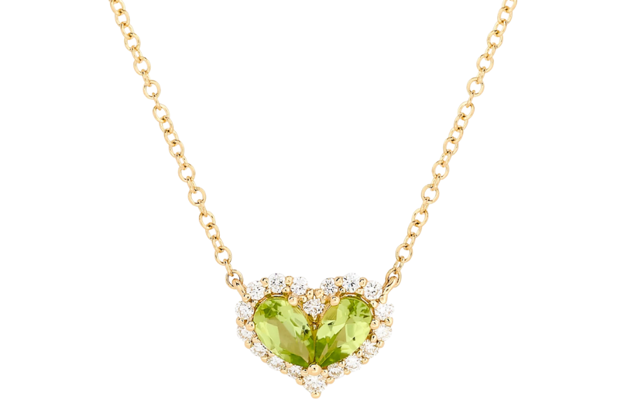 Gold chain necklace featuring a heart-shaped green gemstone pendant, bordered by small round white stones.