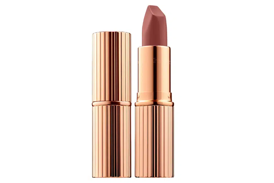 A tube of rose gold lipstick with the cap removed and standing upright beside it, revealing a mauve-pink colored lipstick bullet.