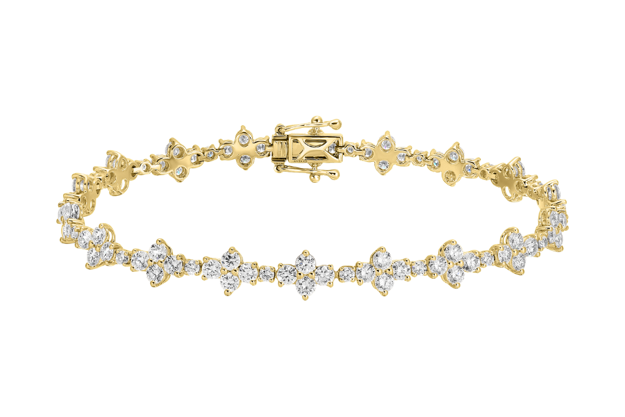 A gold bracelet featuring a series of sparkling round and marquise-cut diamonds arranged in an elegant, repeating pattern with a secure clasp.