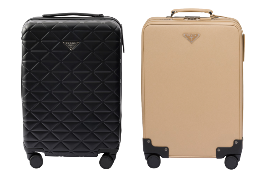 Two Prada hard-shell carry-on suitcases on white background: one is black with a quilted diamond pattern, the other is tan with a smooth surface and black corner protectors; both have wheels, handles, and Prada logos.