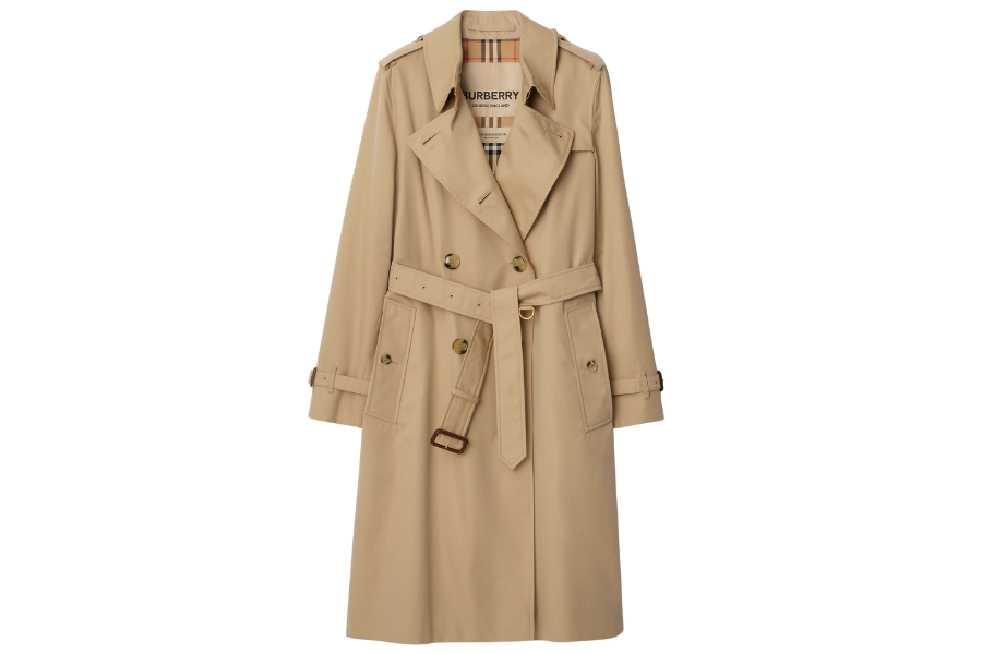 A classic beige trench coat with a belted waist, double-breasted front, shoulder epaulettes, and a Burberry check lining visible at the collar.