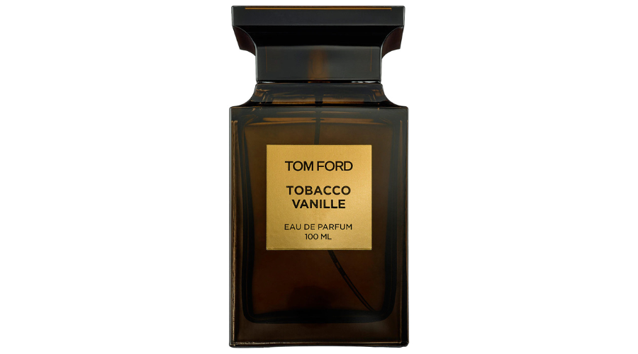 A rectangular dark brown glass bottle of Tom Ford Tobacco Vanille eau de parfum, 100 ml, with a gold label and black cap.