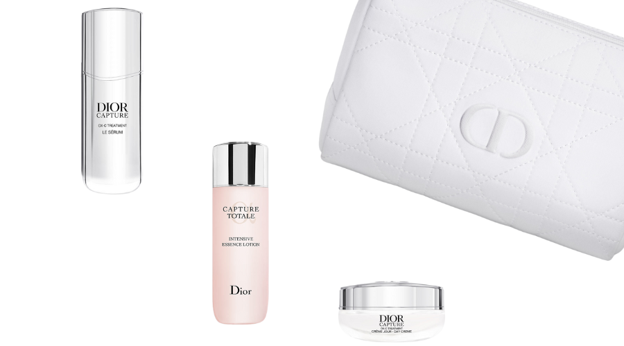 Three Dior Capture Totale skincare products and a white quilted Dior cosmetic pouch with a CD logo are arranged on a white background.