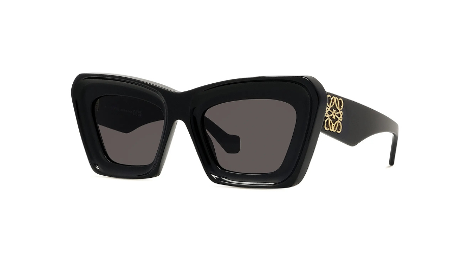 Black rectangular sunglasses with thick frames, dark lenses, and a gold decorative emblem on the temples, displayed against a white background.