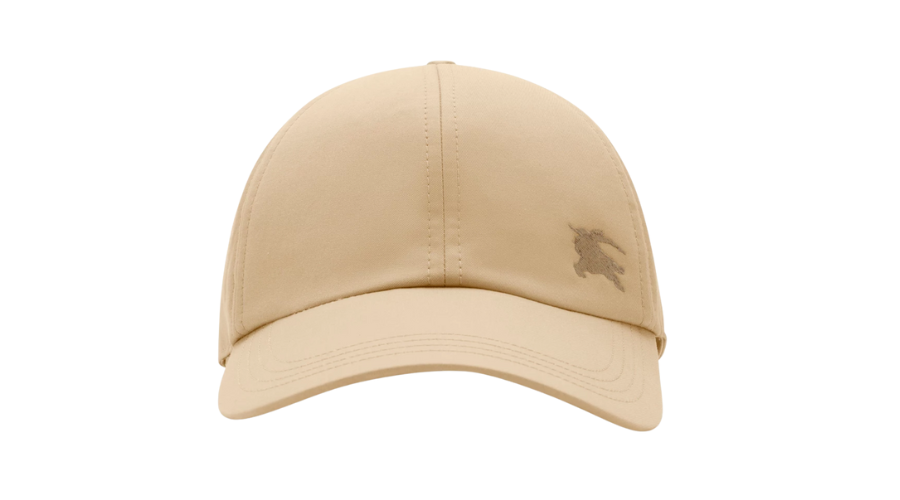 Beige baseball cap with a small embroidered logo of a knight on horseback on the right front panel, displayed against a white background.