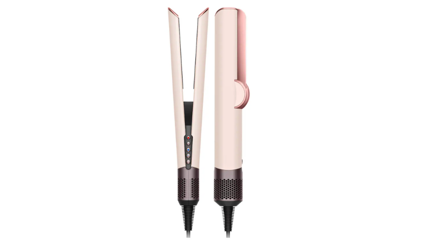 A sleek, pink and rose gold hair straightener with rounded edges, black power cords, and visible control buttons on the handle, shown from the front and side against a white background.