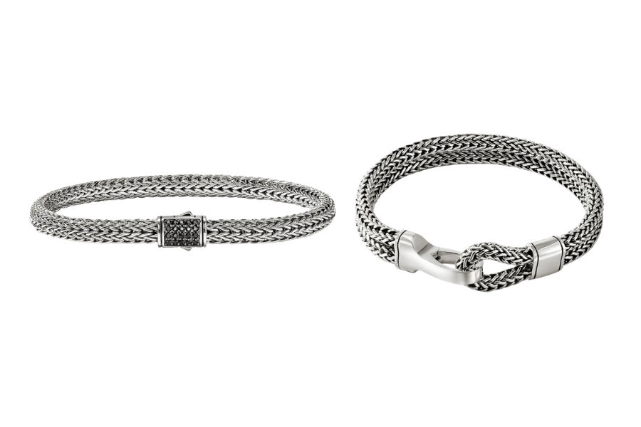 Two silver woven chain bracelets on a white background; the left bracelet has a rectangular clasp, while the right bracelet features an intricate knot design with smooth metal detailing.